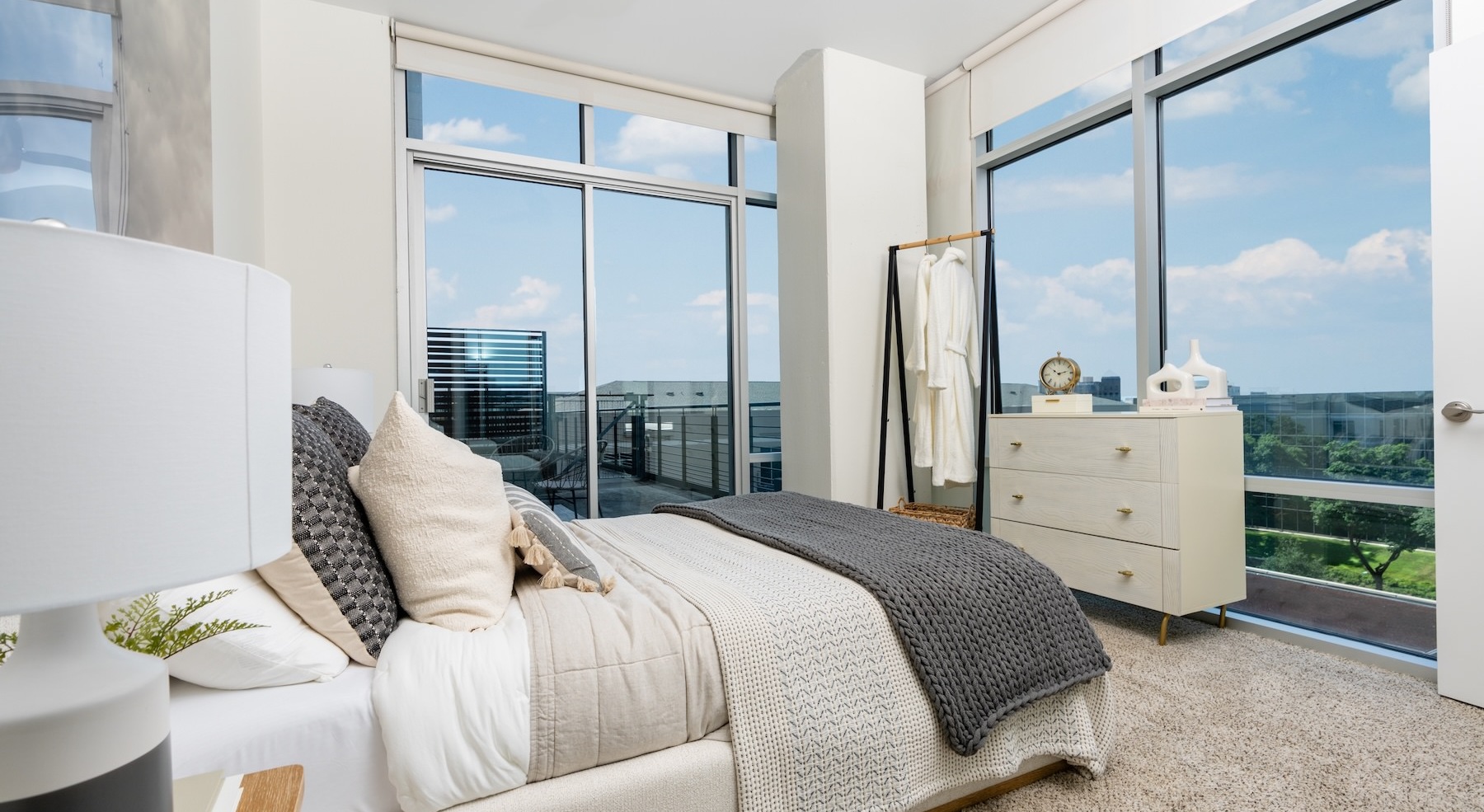 Bedroom with natural lighting and high ceilings