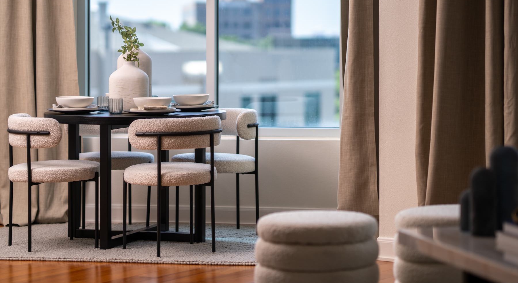 a spacious dining area overlooking a city
